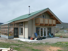 The Maechtlen cottage is made from recycled pallets re-made into a Insulated Concrete Form to give this house high thermal mass. This is a solar passive house with a green house attached.
